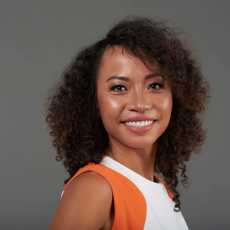 Foto ilustrativa de uma paciente sorrindo